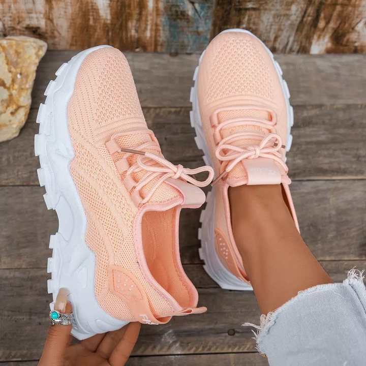 Supportive women's lace-up orthopedic sneakers designed for active walking, everyday comfort, and foot health.