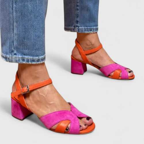 Chic women's pink wedge heel sandals with adjustable strap & open toe. Comfortable summer fashion footwear.