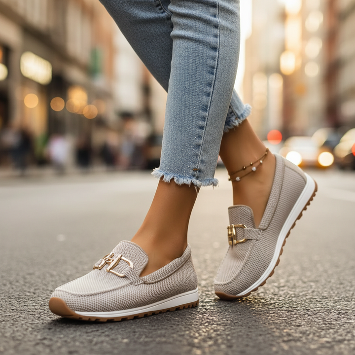Comfortable white Suzane orthopedic loafers for women. Cushioned slip-on shoes, great for work.