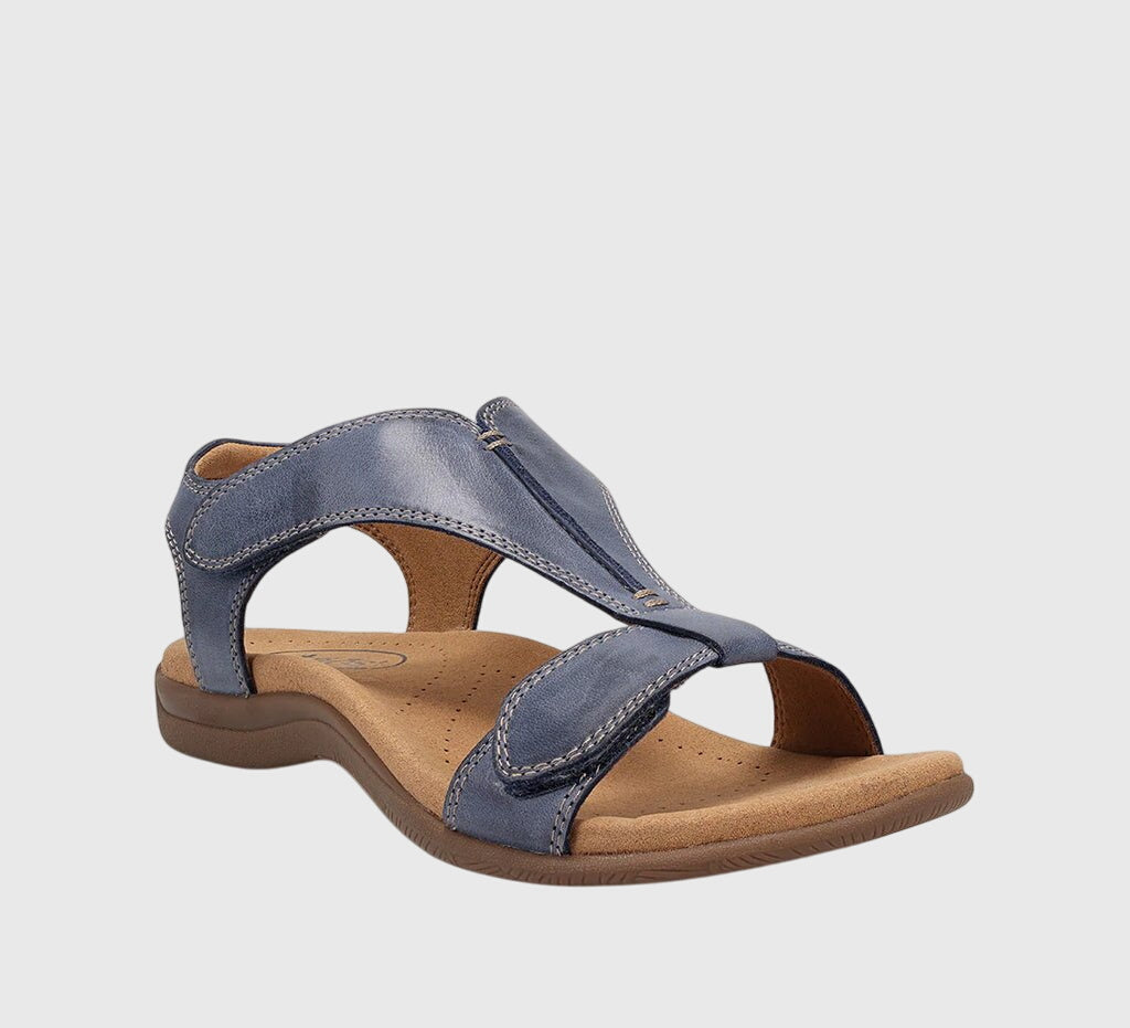Casual women's T-Bar flat sandals with adjustable straps, perfect for summer comfort.