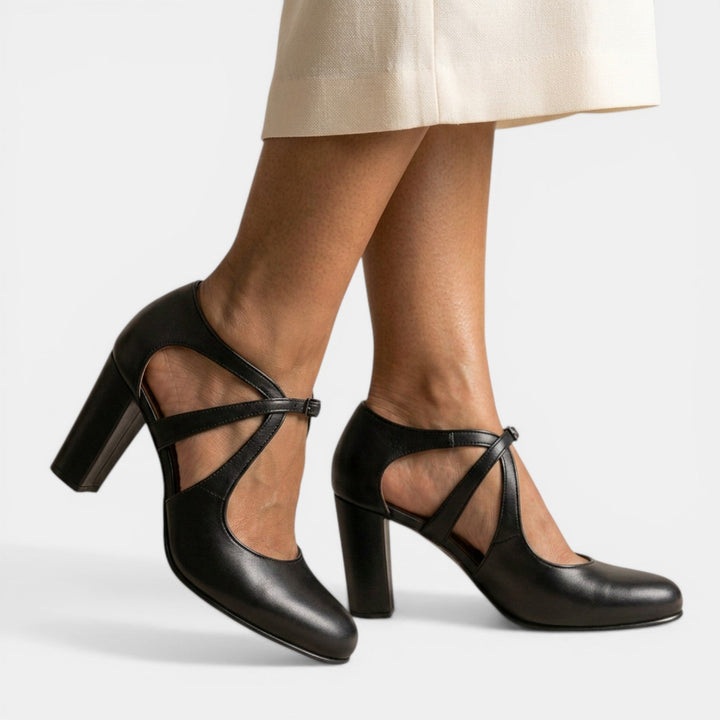 Women's High Heel T-Strap Sandals, a sophisticated round toe design with a secure buckle, ideal for dressing up.