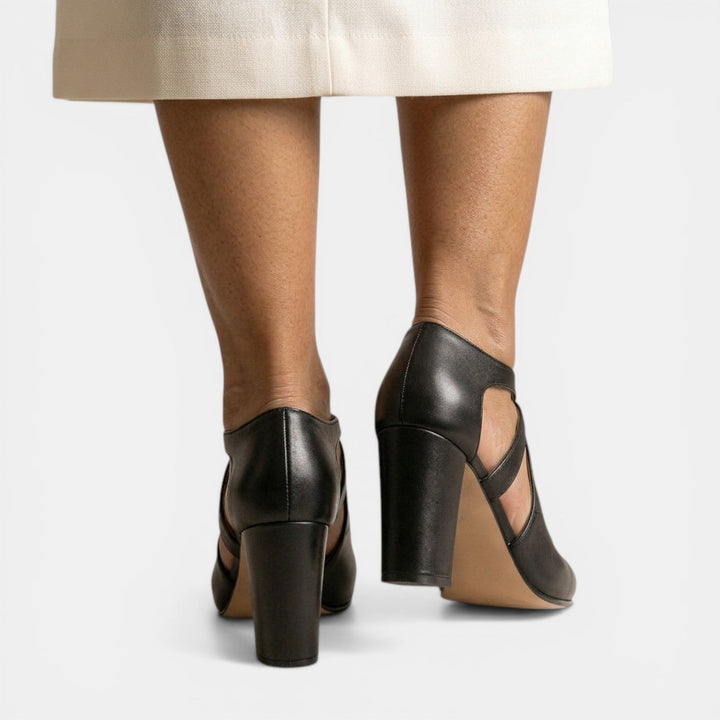 Stylish women's T-Strap High Heel Sandals with a round toe and buckle closure, versatile for dressy wear.