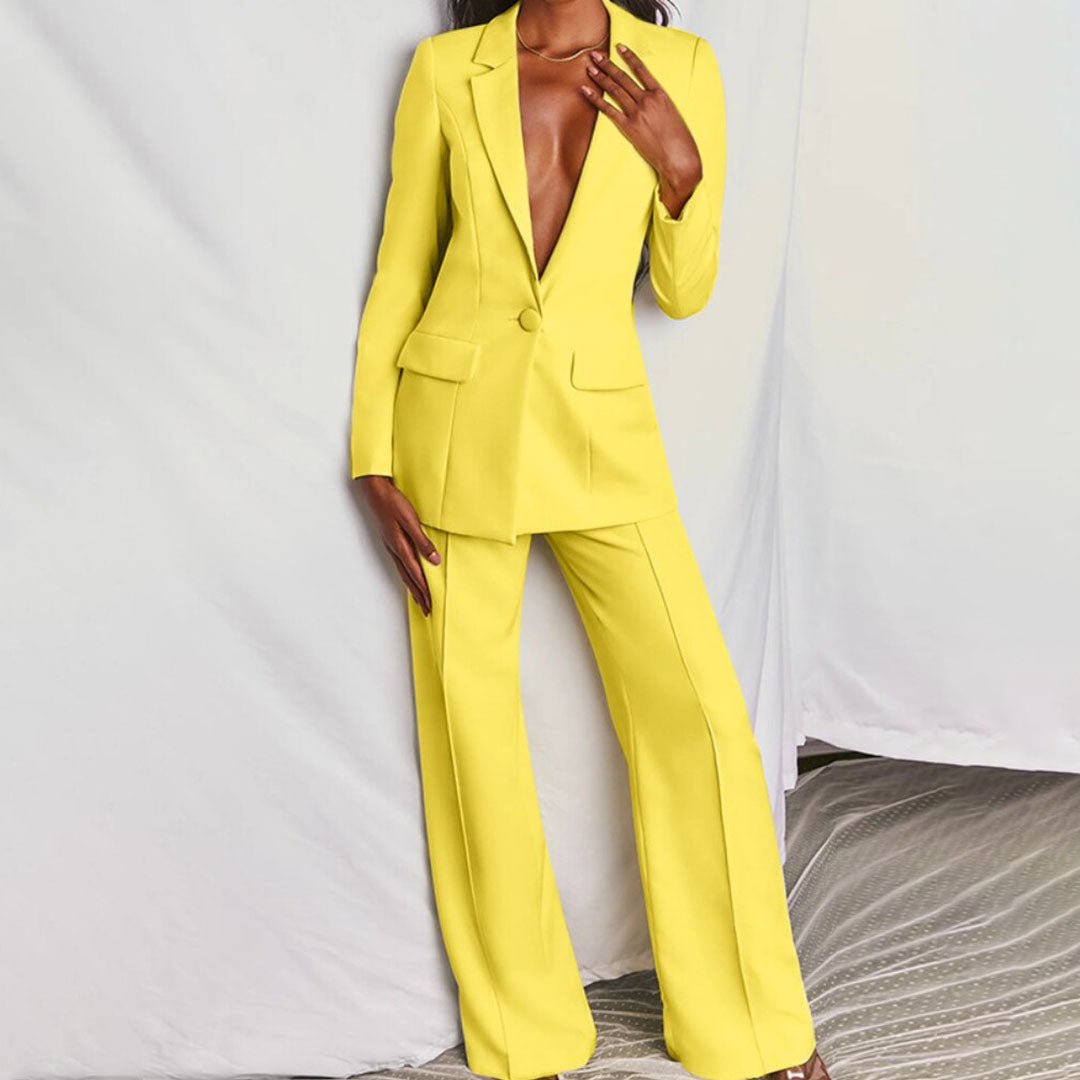Women's tailored blazer & trousers matching set, chic and professional office attire for modern style.