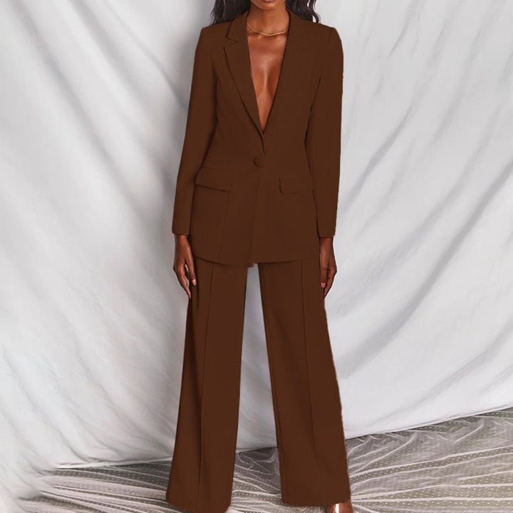 Modern women's tailored blazer & trousers set, creating a chic professional outfit for contemporary style.