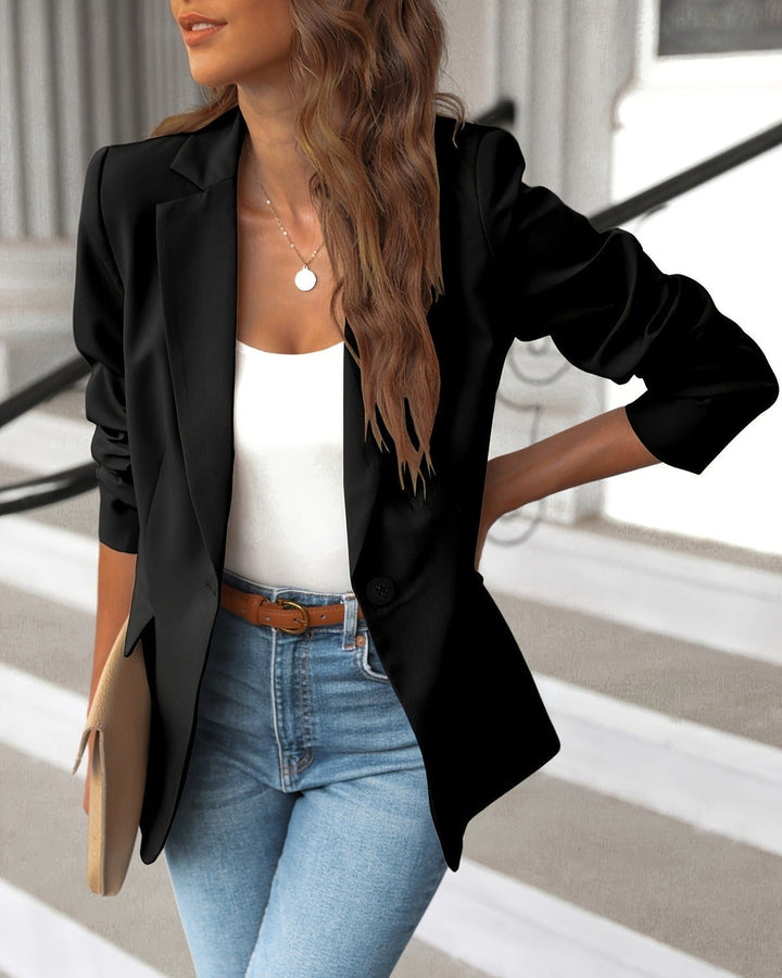 Classic women's professional single-button tailored blazer with modern ruched sleeves for an elegant, chic look.