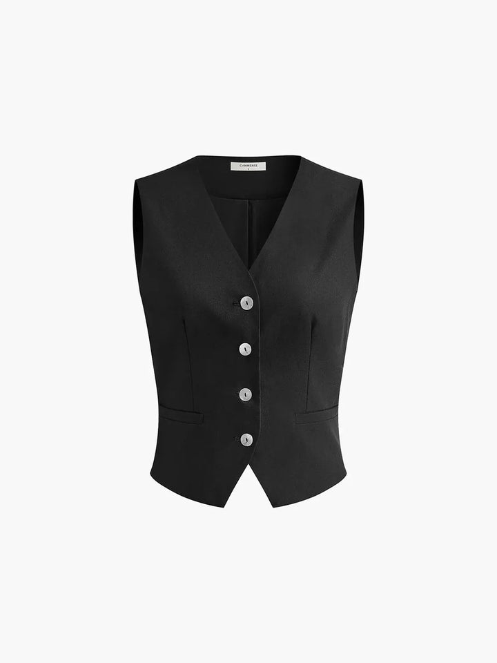 Fashionable women's tailored waistcoat and wide-leg trouser set, embodying chic summer style & elegance.