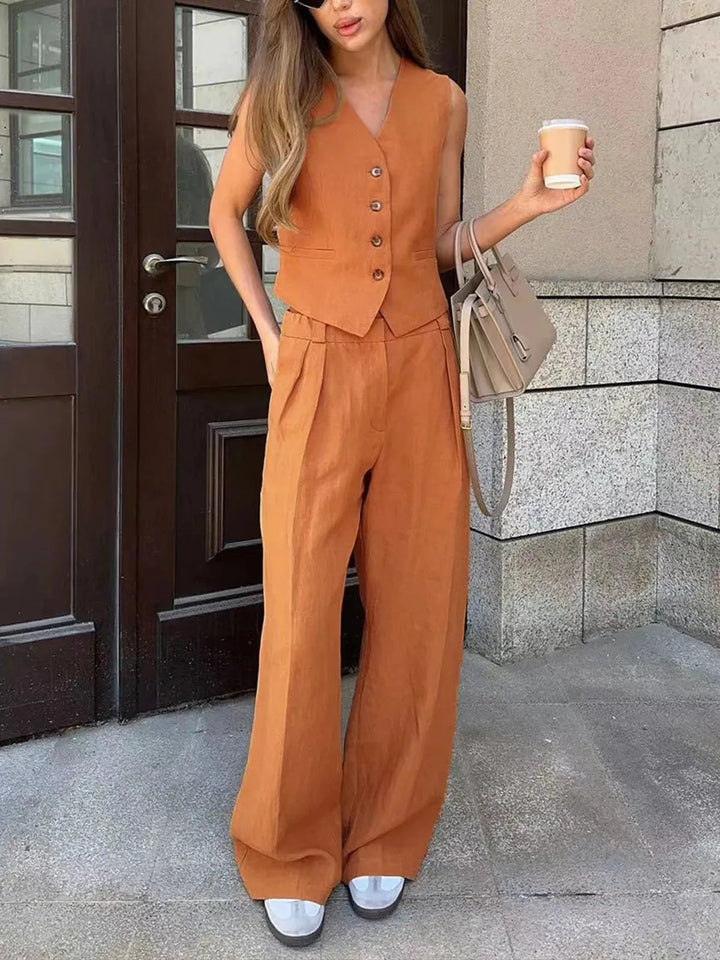 Versatile women's tailored waistcoat and wide-leg trouser set, perfect for smart casual summer fashion.