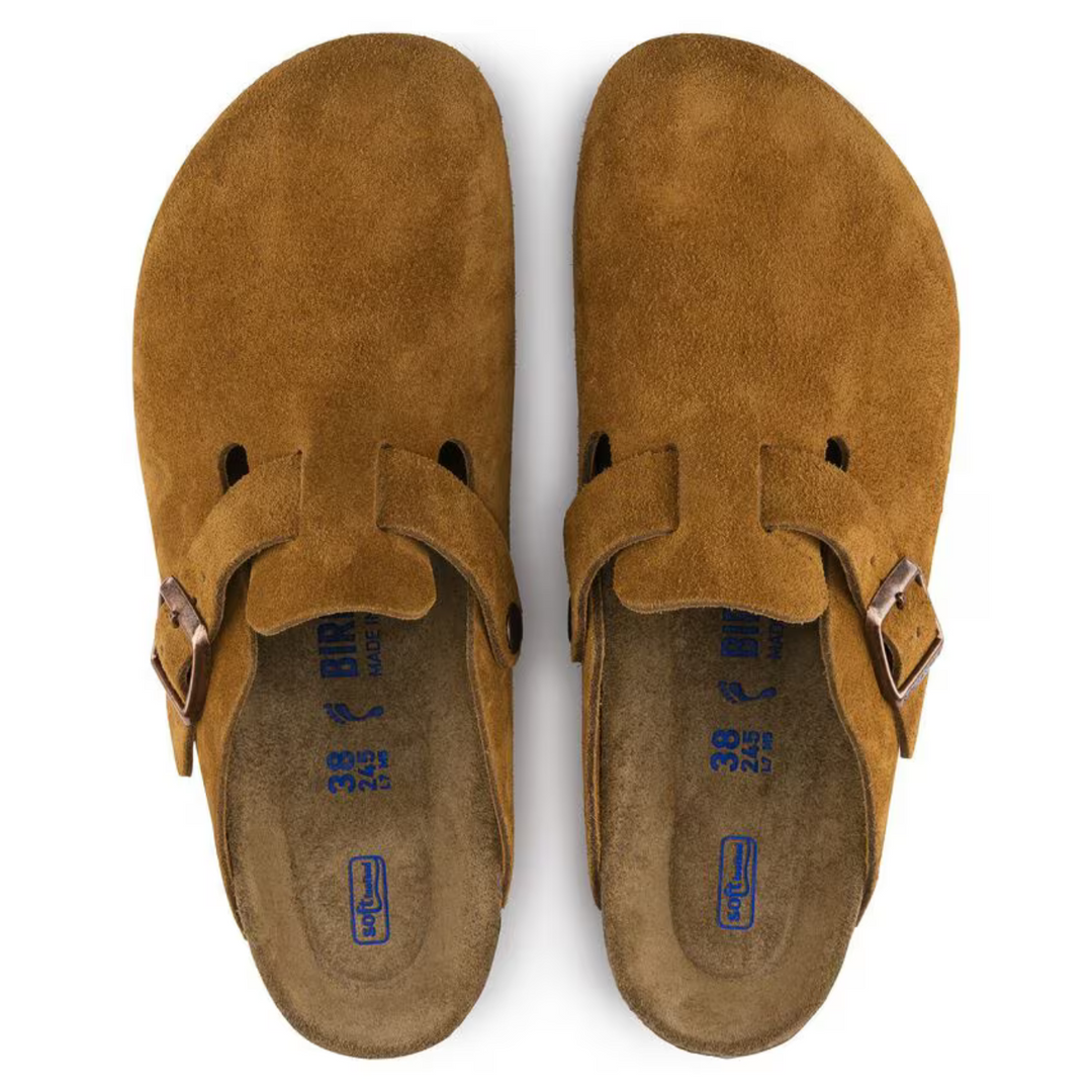 Stylish taupe slip-on clogs for women, offering easy wear and all-day comfort with a supportive footbed.