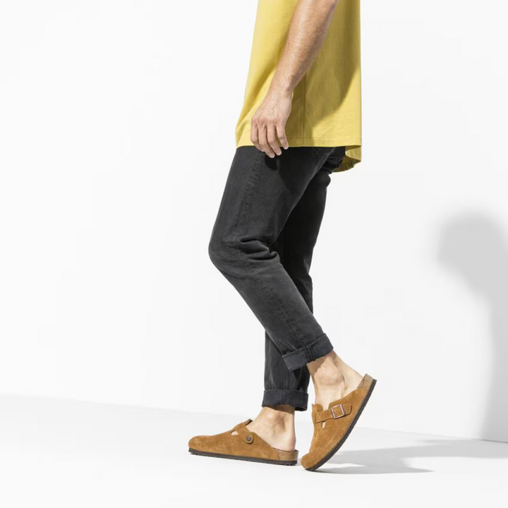 Women's taupe walking clogs with an adjustable strap and cushioned anatomical footbed for ultimate comfort.