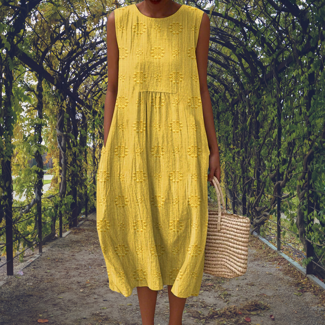 Elegant sleeveless women's midi dress with unique texture, great for warm weather & everyday.