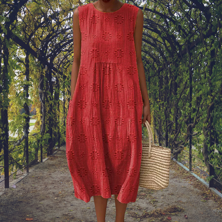 Stylish women's summer midi dress, sleeveless and textured, perfect for a chic casual look.