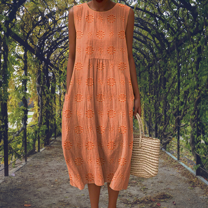 Textured flowy midi dress for women, sleeveless design offers effortless summer comfort & style.