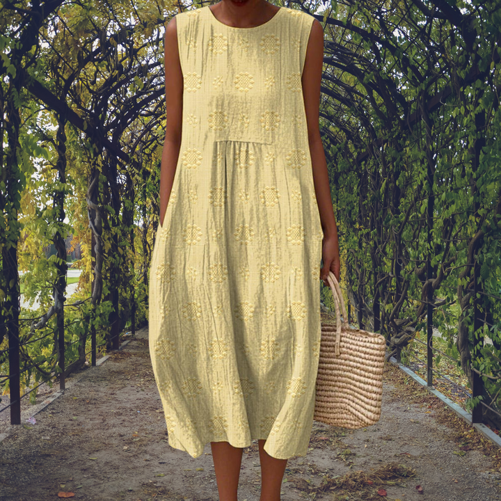 Women's textured sleeveless midi dress, a chic and casual choice for summer and everyday wear.