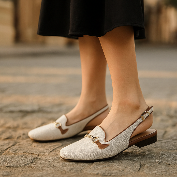 Side view of women's textured slingback loafer flats, highlighting the secure slingback strap.