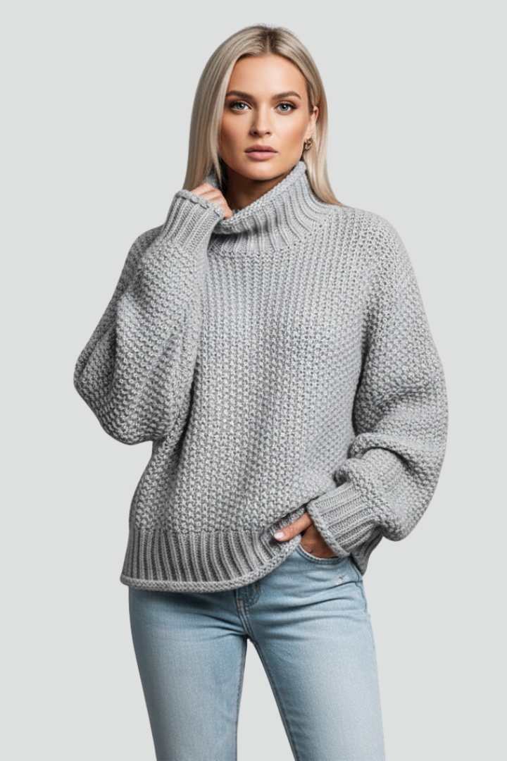 Front view: Women's long sleeve textured turtleneck sweater, ideal for fall fashion.