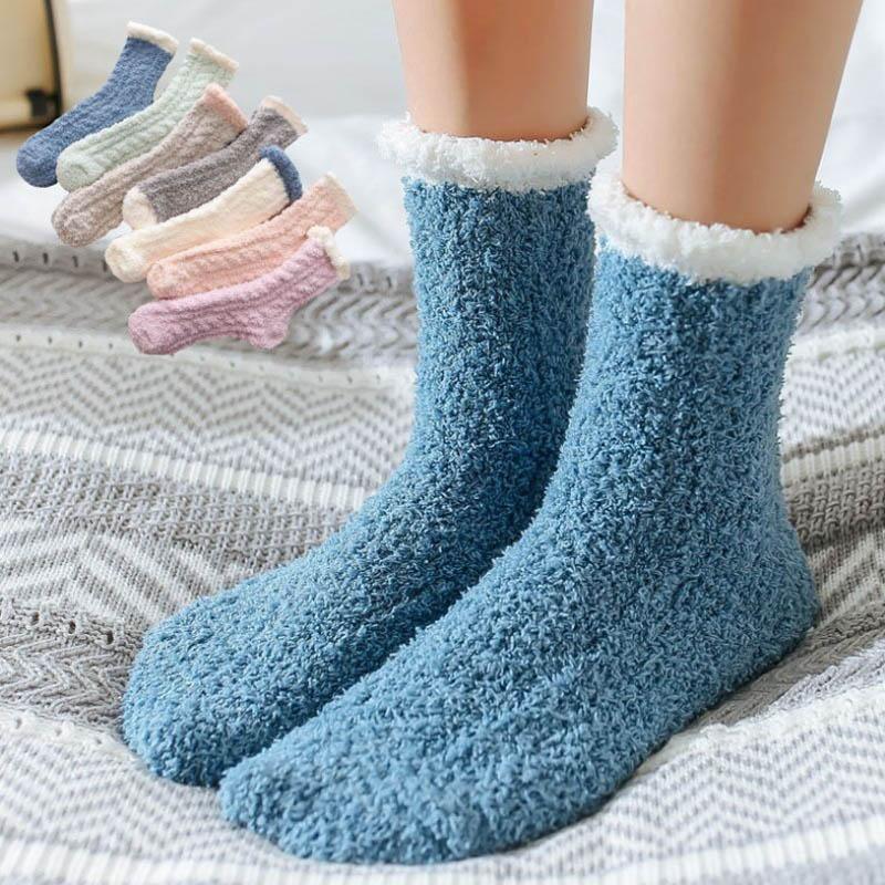 Pair of women's lamb wool blend fleece-lined thermal winter socks, perfect for cold weather.