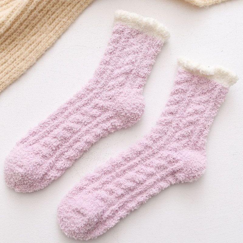 Soft, thick women's thermal winter socks made with lamb wool, ideal for cold feet.