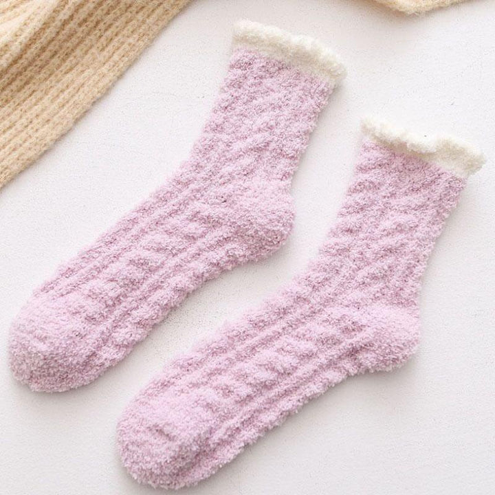 Soft, thick women's thermal winter socks made with lamb wool, ideal for cold feet.