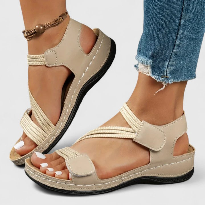 Posture correcting women's sandals: three-arch support orthopedic design for comfortable walking.