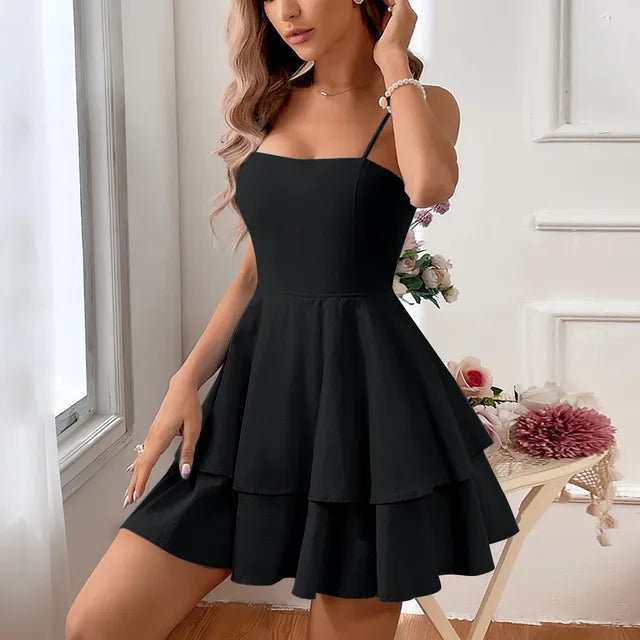Women's tiered A-line mini homecoming dress with delicate spaghetti straps, perfect for parties & special occasions.