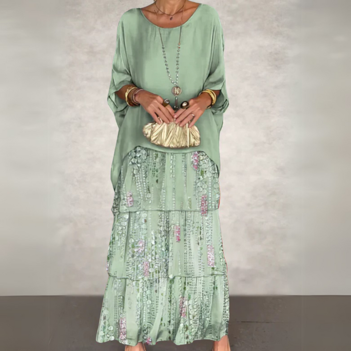 Elegant long sleeve maxi dress for women, with a chic tiered skirt design, offering comfort and relaxed fit.