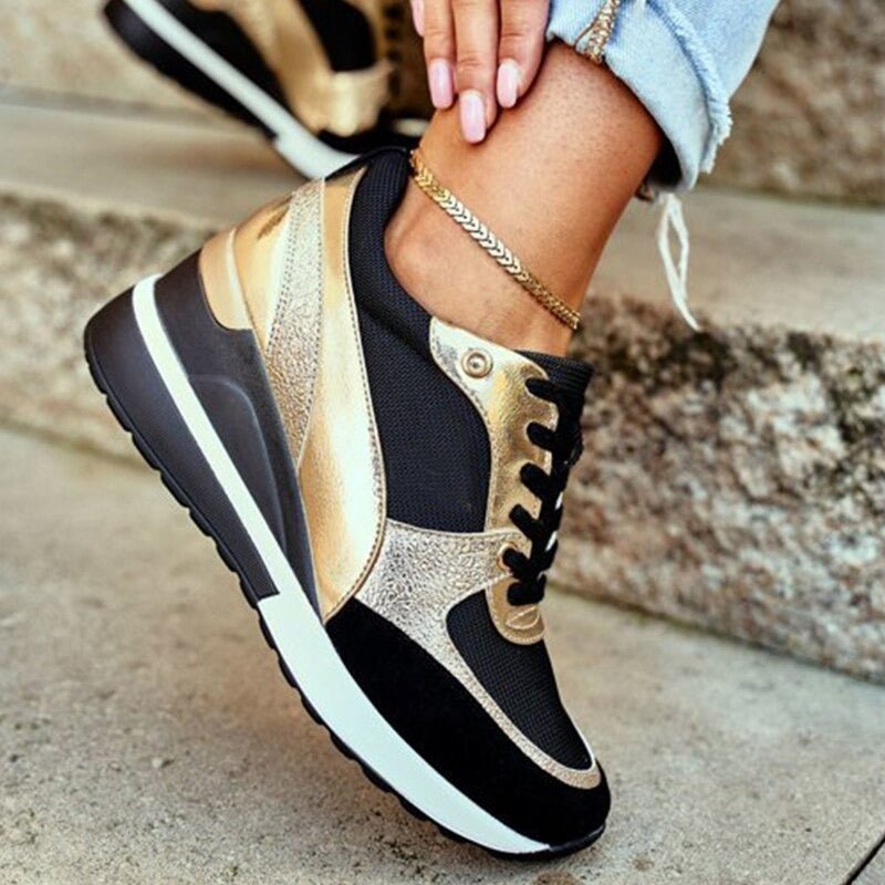 Stylish women's gold & black non-slip sneakers, offering comfort and an athletic fashion look