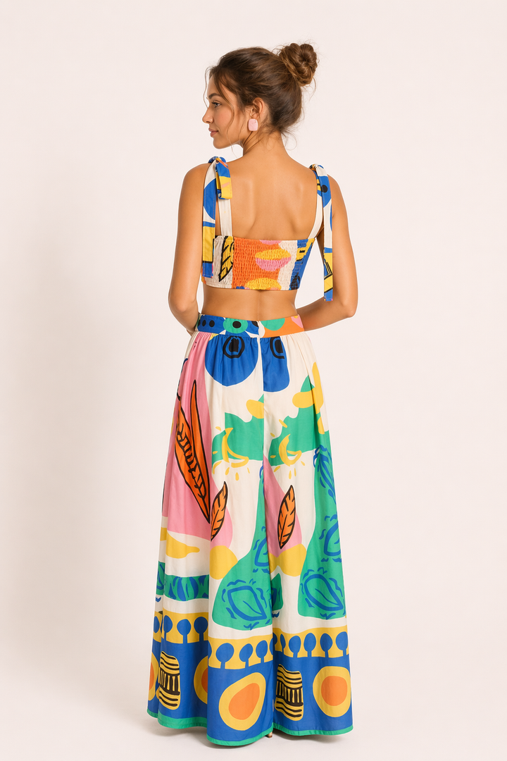 Stylish women's tropical print crop top and maxi skirt summer set, perfect for beach, resort, or vacation.
