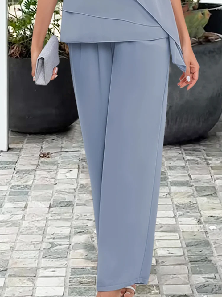 Modern women's matching two-piece set: short sleeve top & straight leg pants. Versatile for spring & summer casual wear.