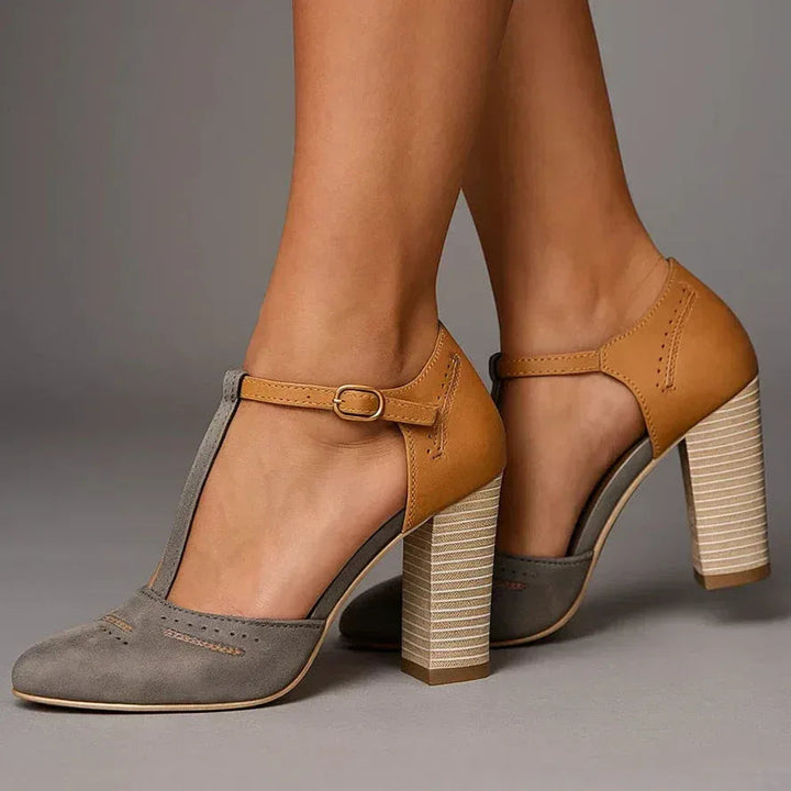 Women's two-tone block heel pumps with a comfortable, classic design for versatile daily and office style.