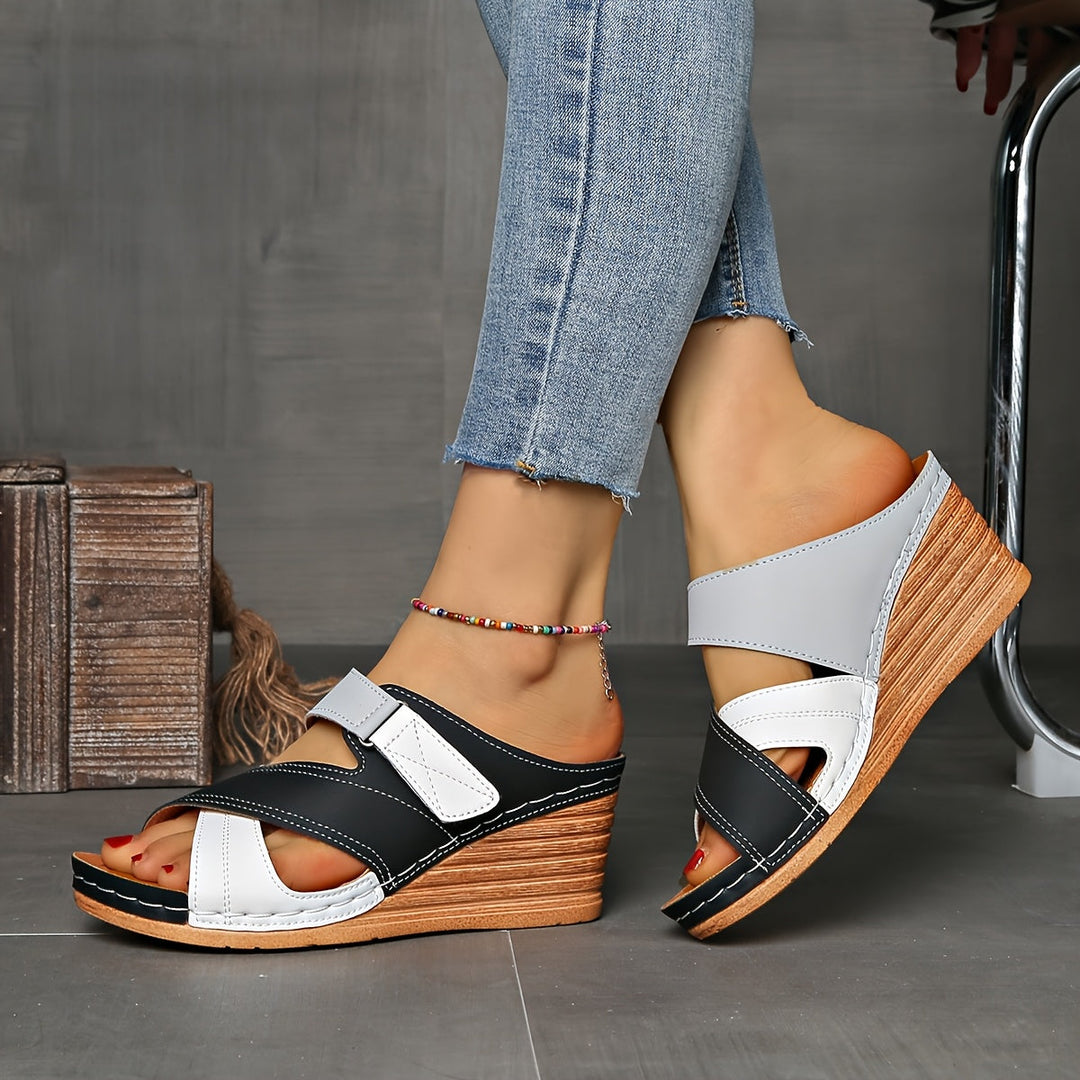 Chic open-toe wedge slides for women, a comfortable and fashionable choice for warm weather and summer styles.