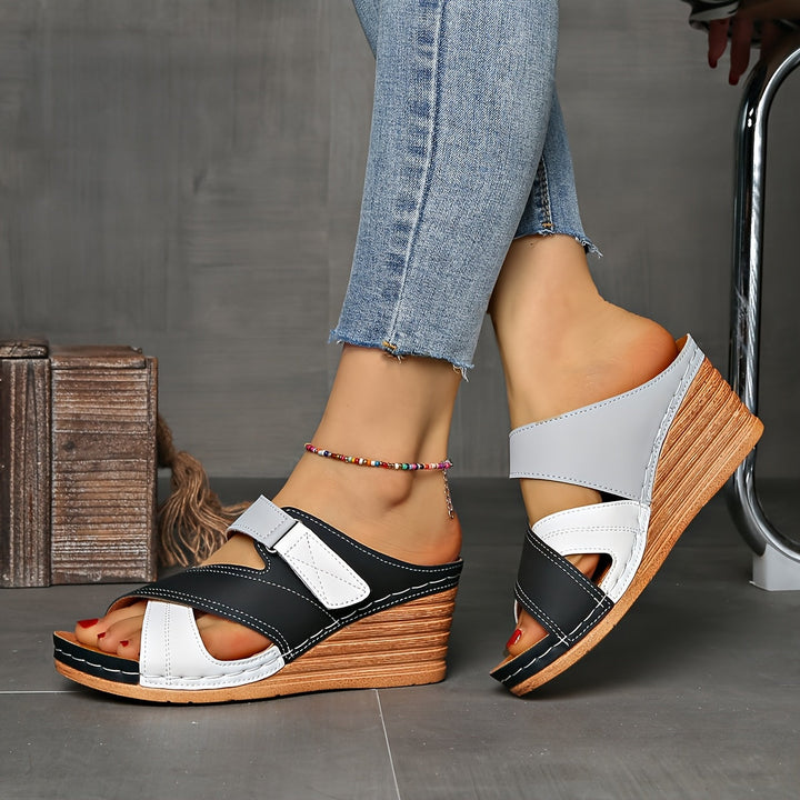 Chic open-toe wedge slides for women, a comfortable and fashionable choice for warm weather and summer styles.