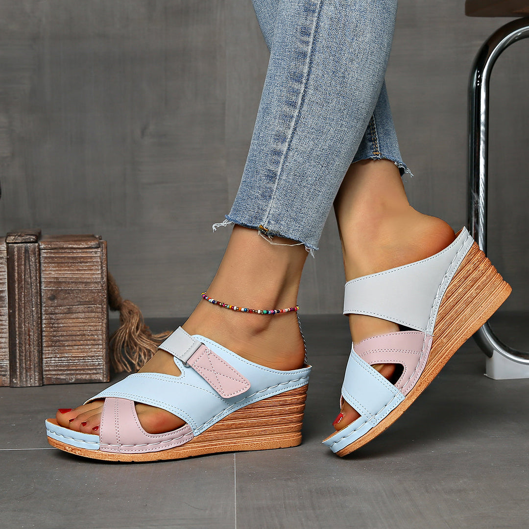 Women's comfortable wedge slides with a fashionable two-tone finish. Excellent summer footwear for everyday wear.