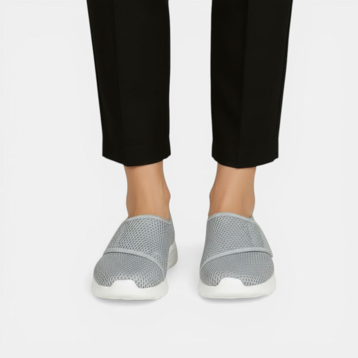 Casual slip-on women's walking sneakers, breathable & lightweight for daily comfort and foot support.