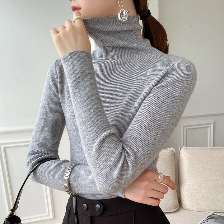Premium women's ultra-soft cashmere turtleneck, a warm and versatile luxury knit for elegant layering.