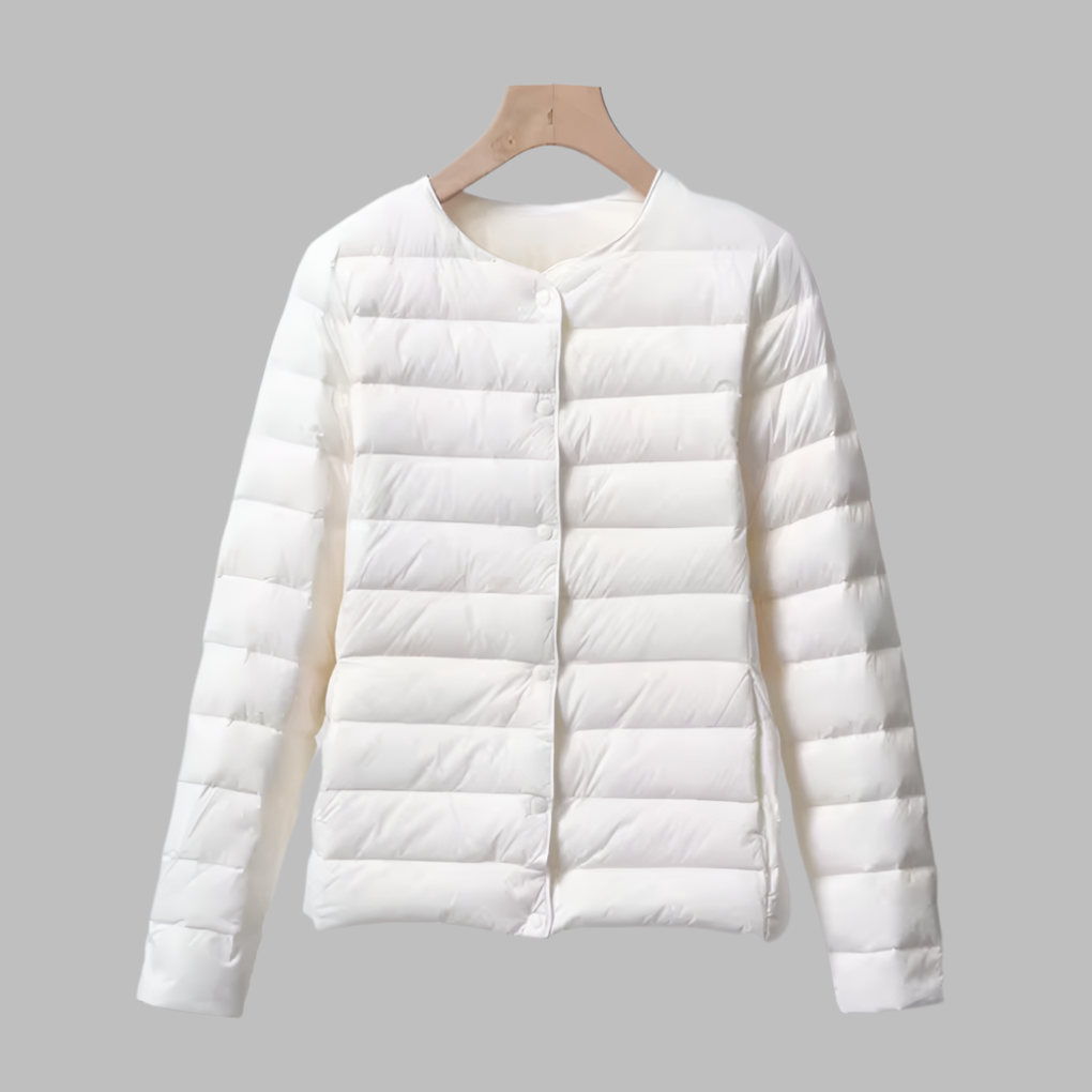 Packable women's ultralight puffer jacket, collarless design for easy layering & travel. Spring/winter outerwear.