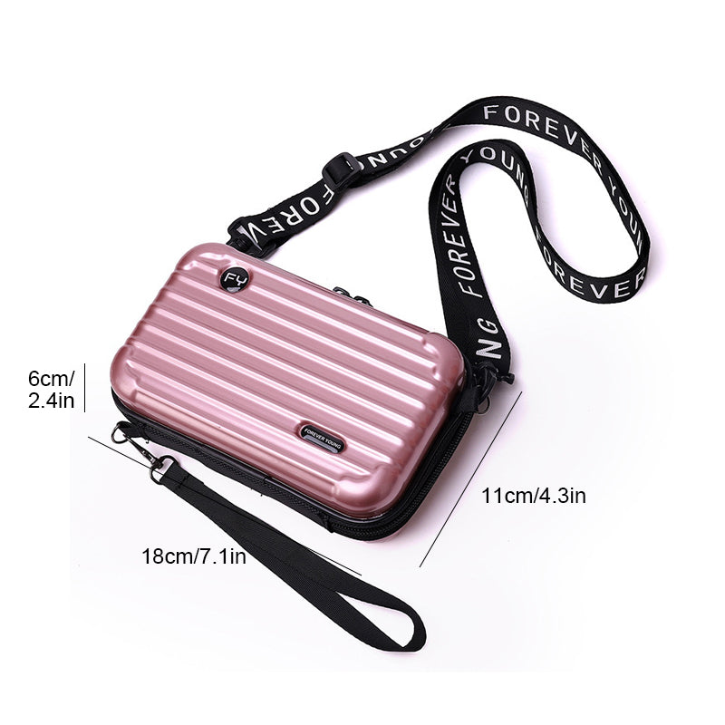 A women's mini suitcase crossbody bag, combining handbag and travel bag functions