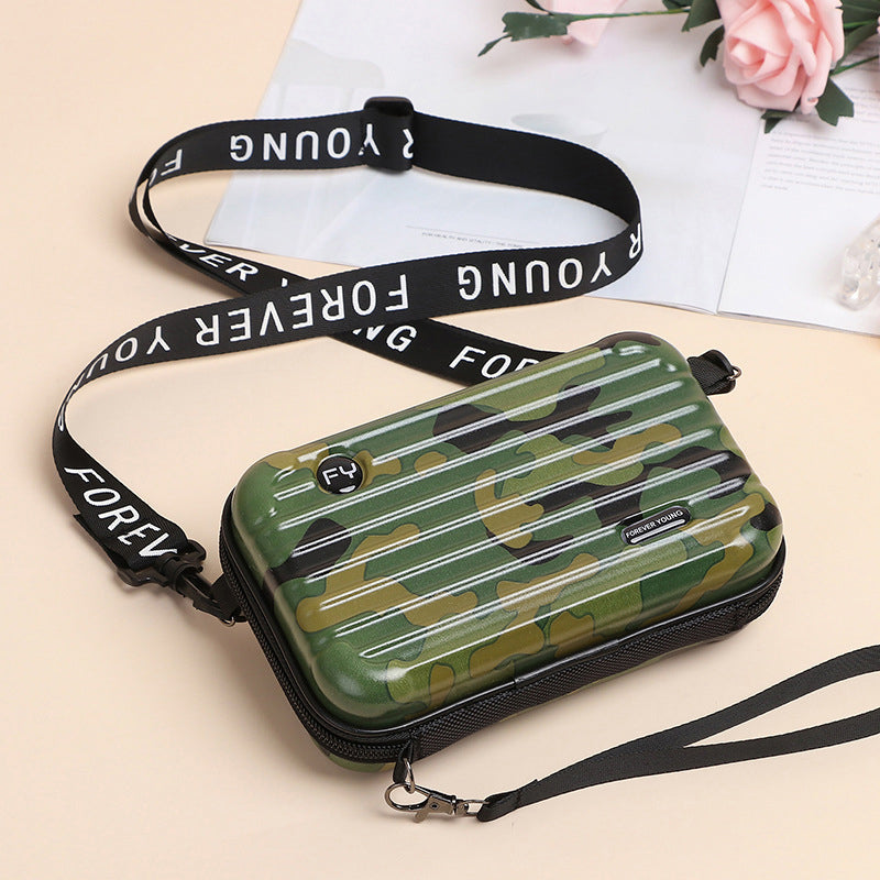 Casual women's mini suitcase crossbody bag styled for everyday wear