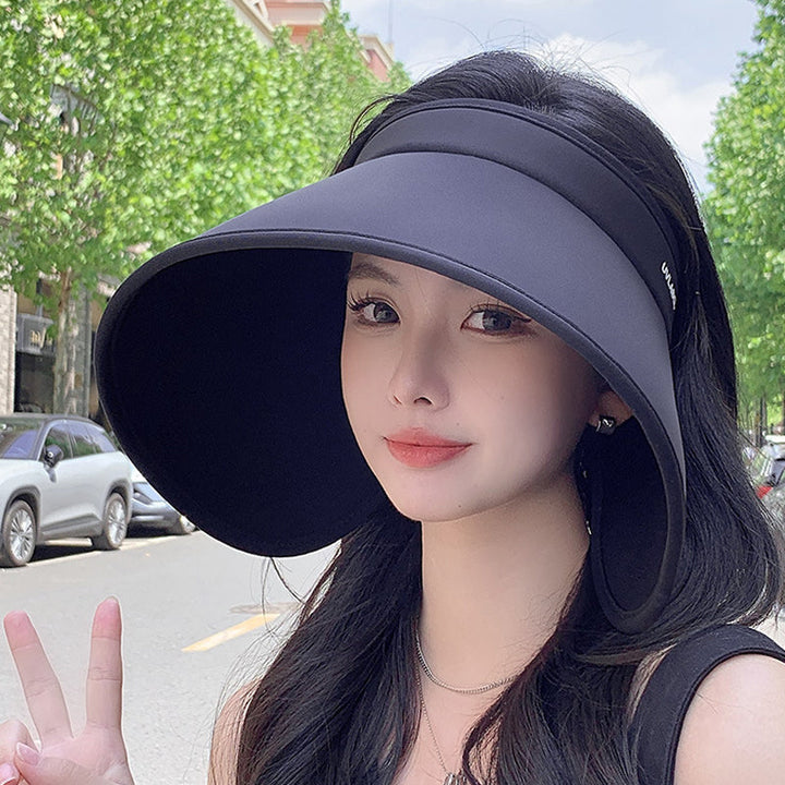 Chic women's UV protection hat, hollow top, wide brim, perfect for sunny outdoor adventures