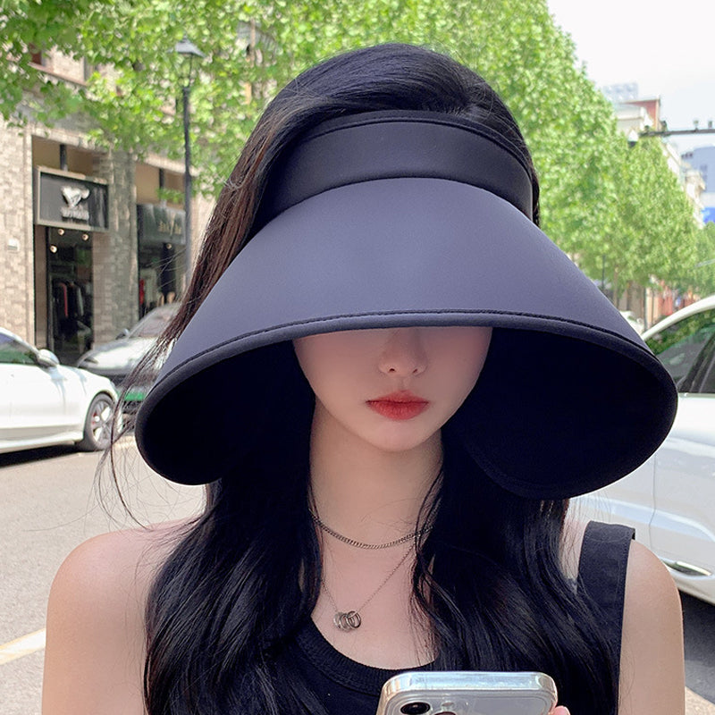Stylish women's sun hat with UV protection, hollow top design, great for summer fashion