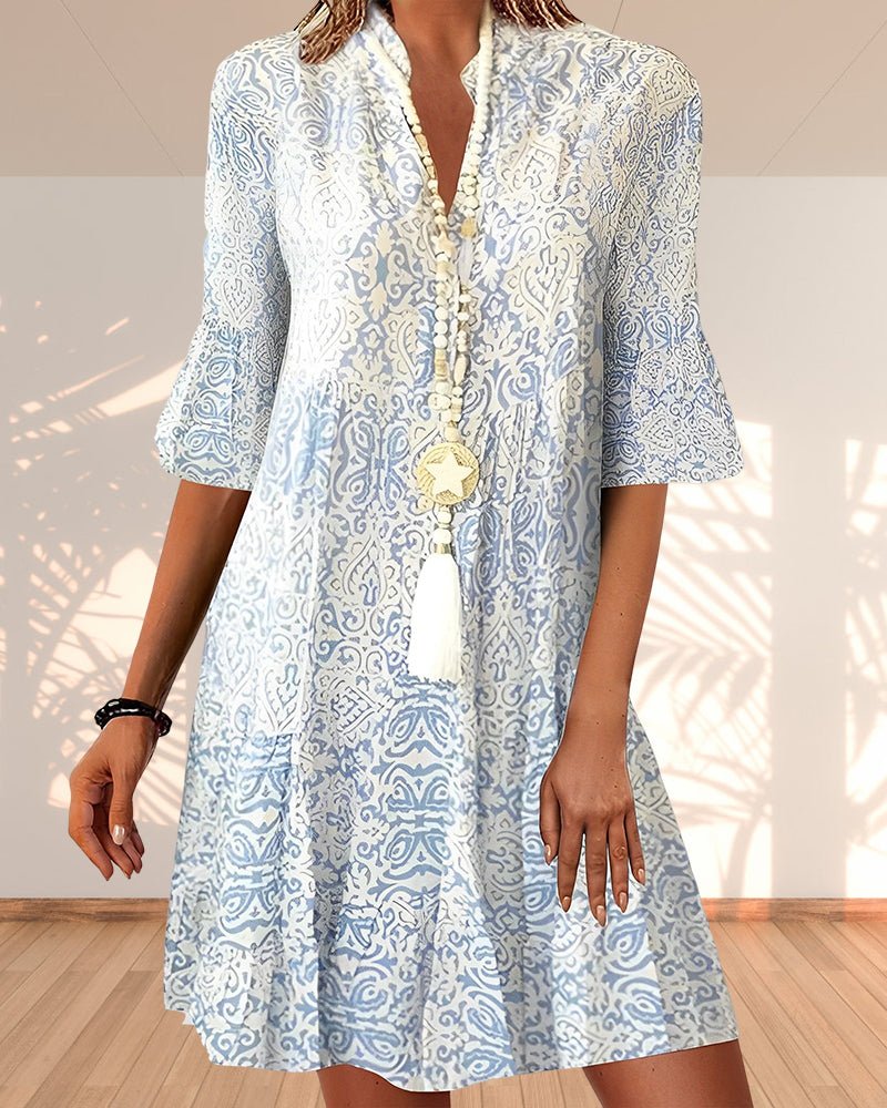 Women's V-neck A-line mini dress, perfect for a chic casual spring or summer look.