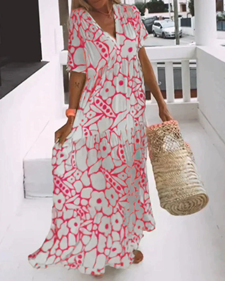 Stylish women's long summer dress featuring a chic V-neck & unique abstract print. Perfect for warm days.