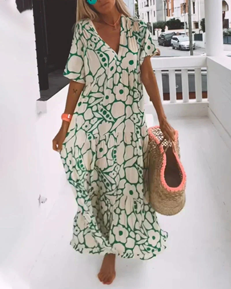 Casual yet stylish V-neck abstract maxi dress for women, ideal for sunny days and vacation adventures.