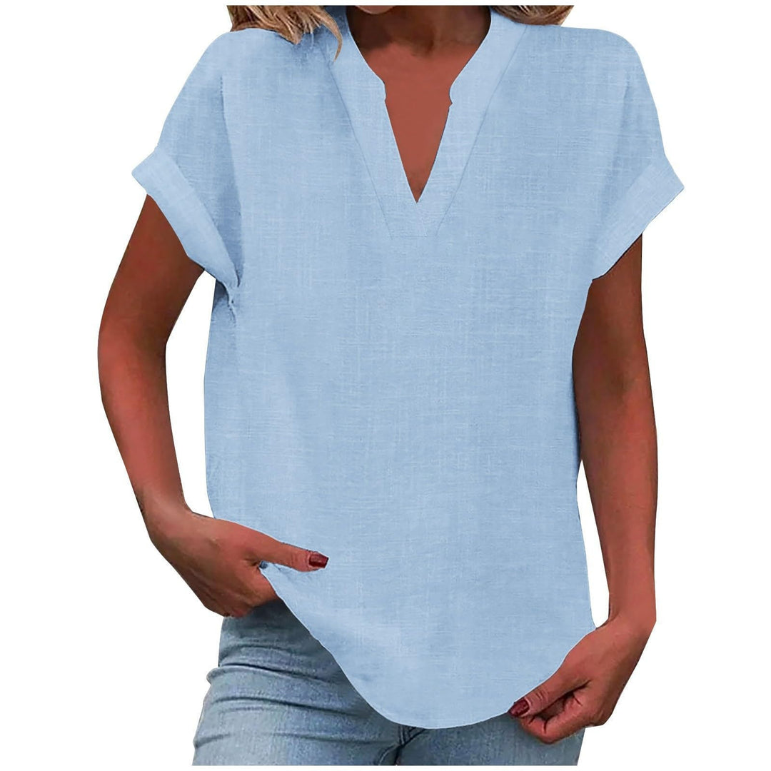 Elegant women's relaxed fit V-neck top with smooth drape. Ideal for smart casual wear.