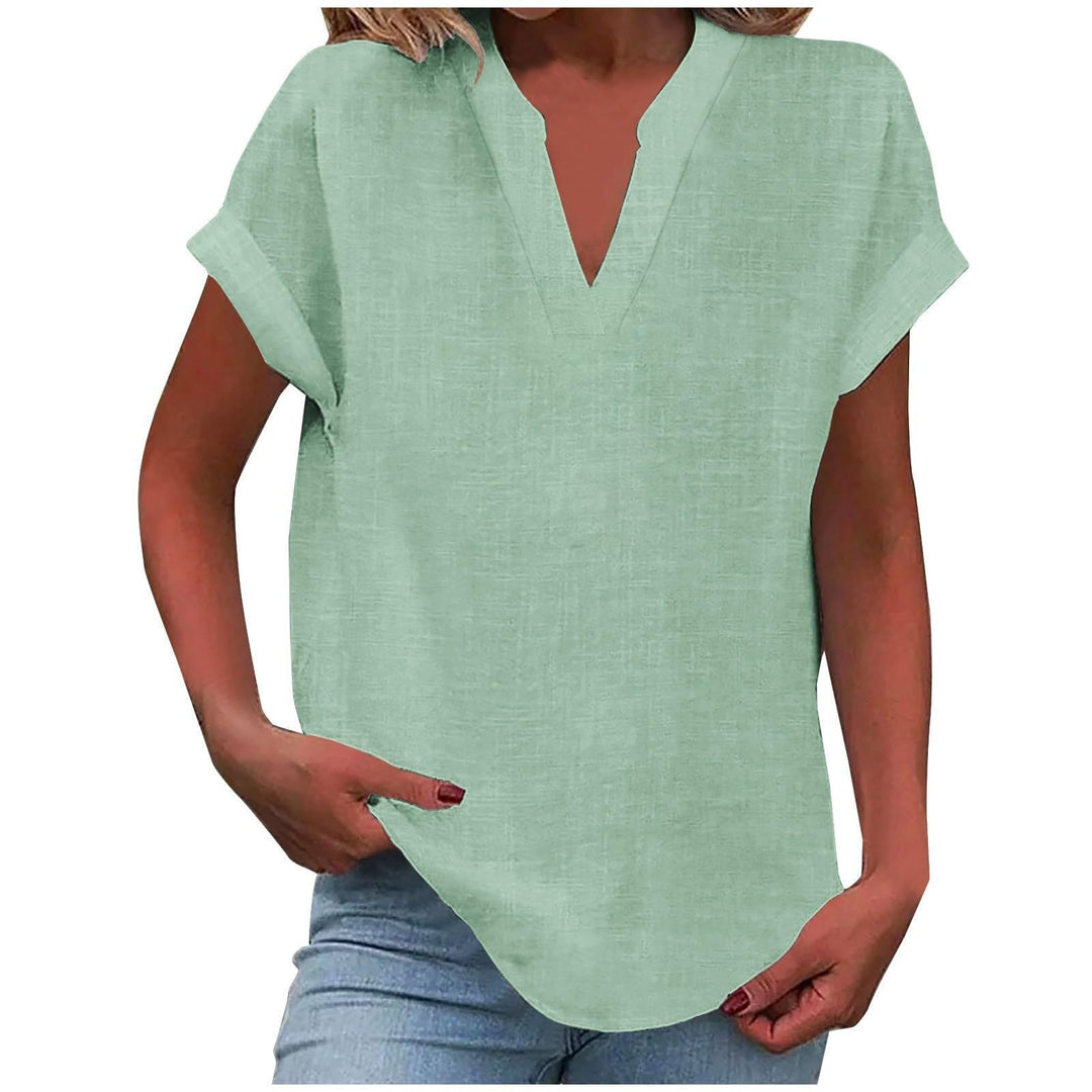 Stylish ladies' V-neck top with relaxed fit & smooth drape. Perfect for summer fashion.