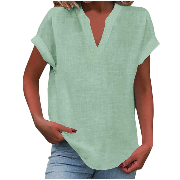 Stylish ladies' V-neck top with relaxed fit & smooth drape. Perfect for summer fashion.