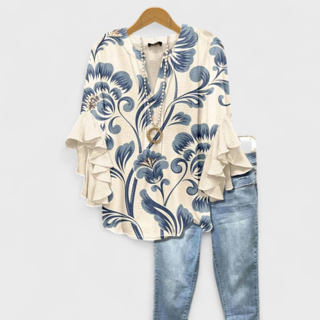Women's V-neck blouse with elegant ruffle sleeves. Perfect for spring & summer fashion.