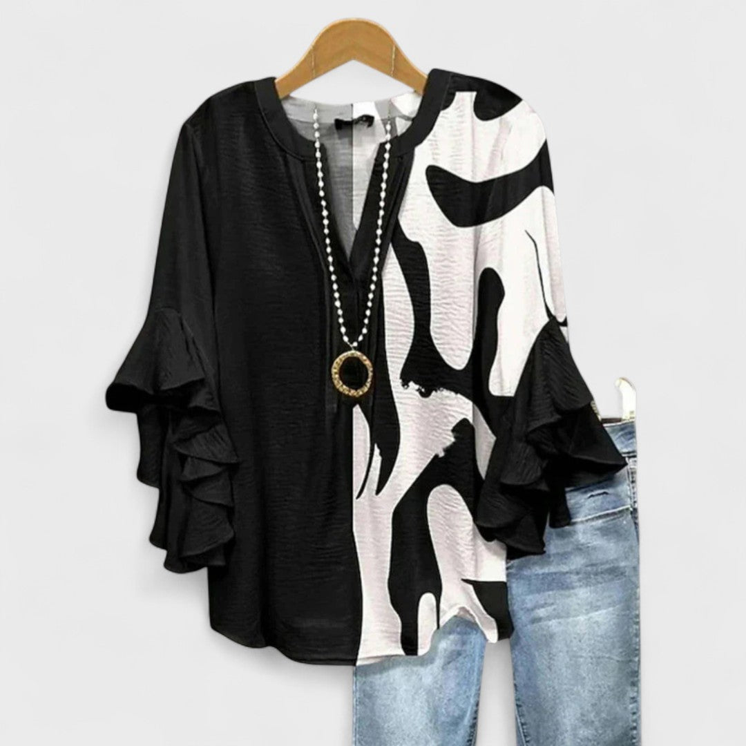 Versatile women's V-neck top with ruffle sleeves, ideal for elegant or casual outfits.