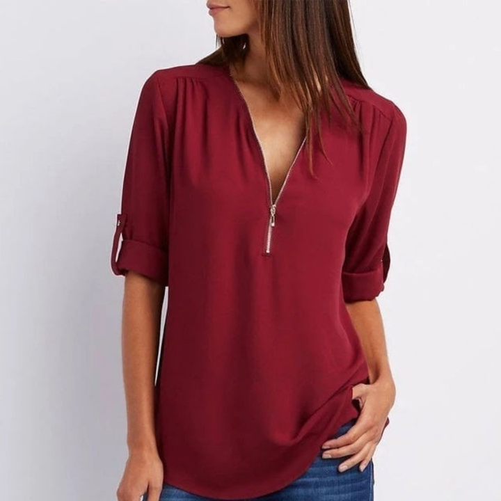 Stylish women's V-neck top with functional roll-up sleeves, great for effortless smart casual and everyday wear.