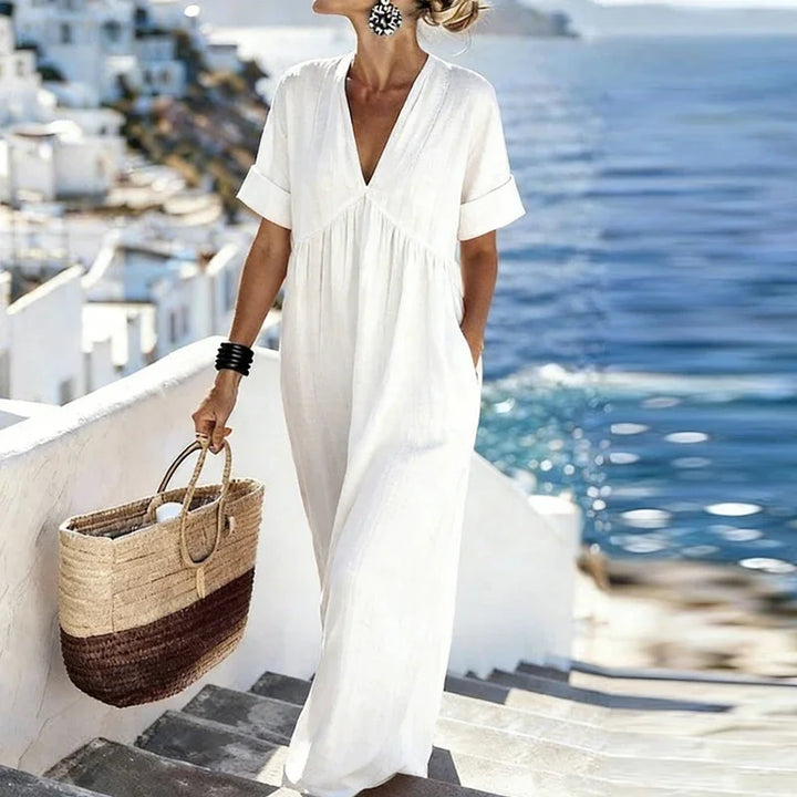 Beautiful women's V-neck bohemian maxi dress, a flowy summer vacation dress with practical pockets.