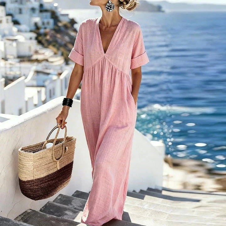 Bohemian V-neck maxi dress for women, a comfortable summer and vacation dress featuring handy pockets.